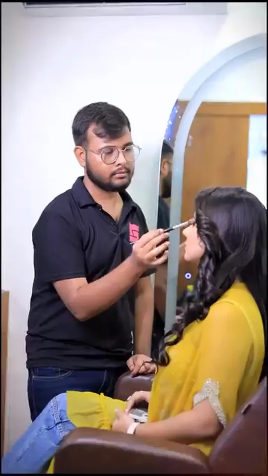 Haldi look from the styled shoot: blush and liner in the chair, then the yellow mirror-work jacket outside with the group.