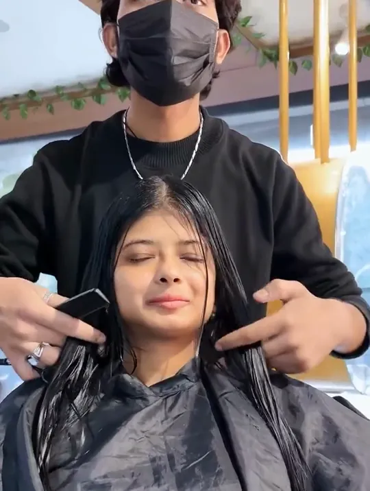 A young woman client shown before and after a haircut.